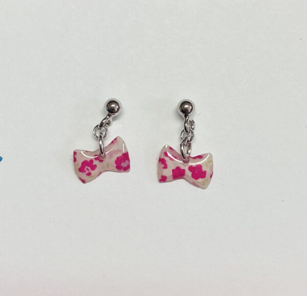 Boucles d'oreilles noeud papillon pendantes en argent 925